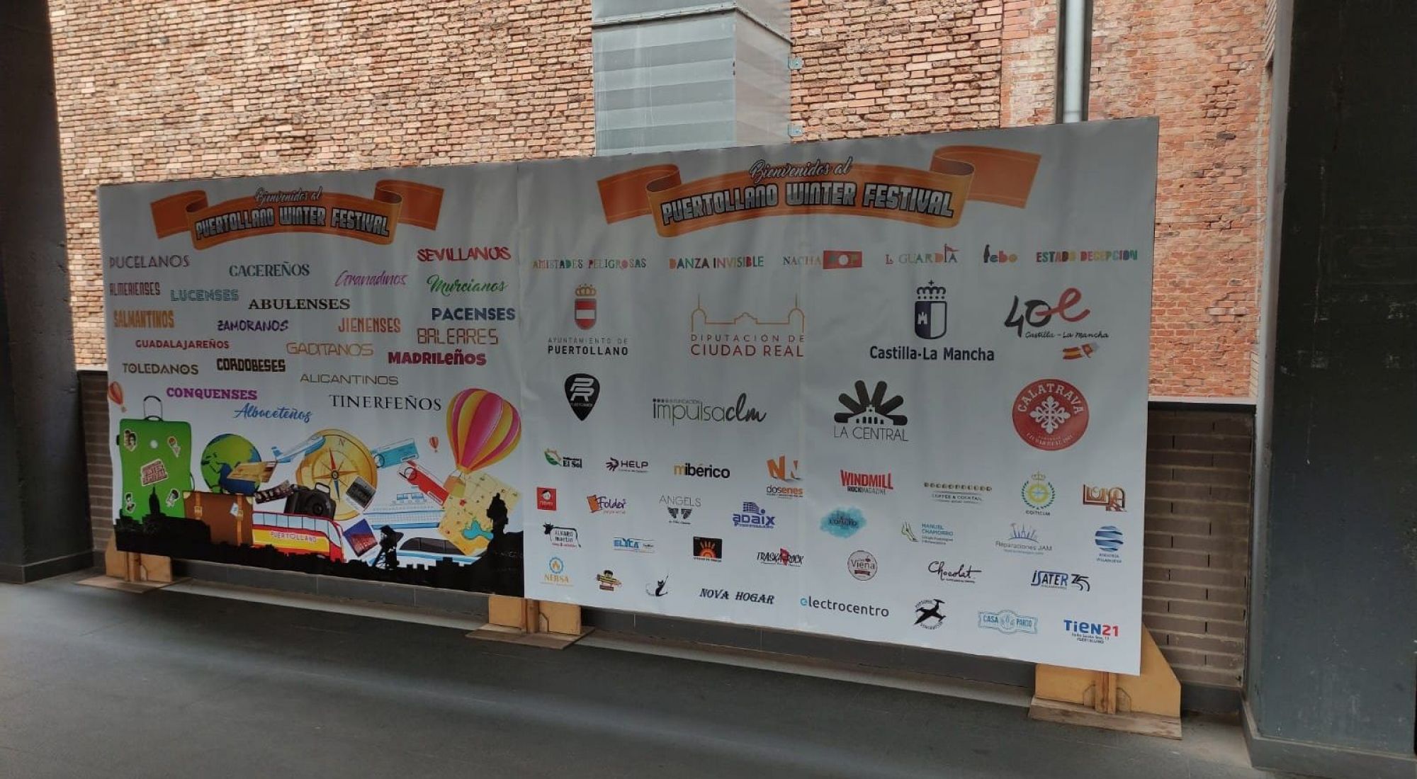 Logo de COITICLM en photocall del Puertollano Winter Festival 2022